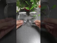 সুগন্ধি বিস্কুট এবং বাদামের জন্য স্বচ্ছ পিইটি প্লাস্টিকের জার